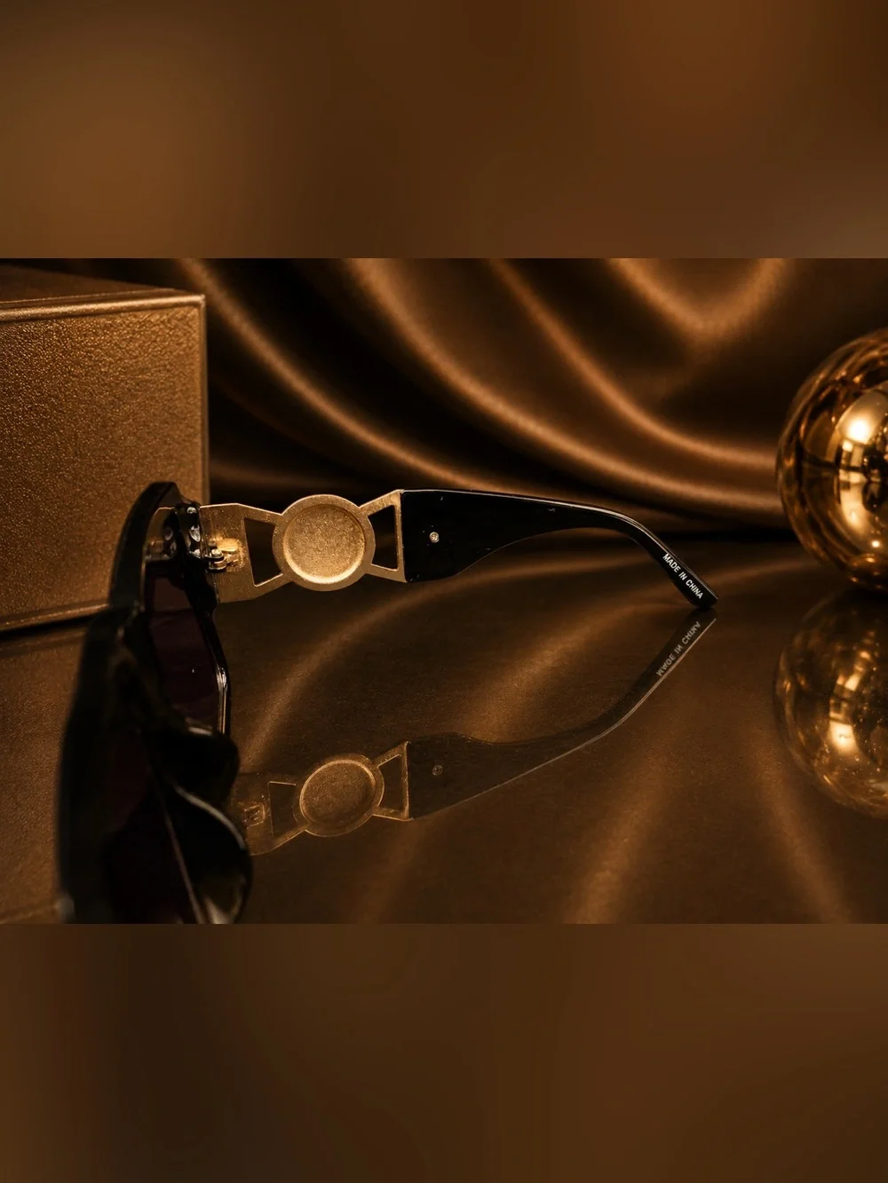 Black Medusa Sunglasses with Gold Medallion Accent